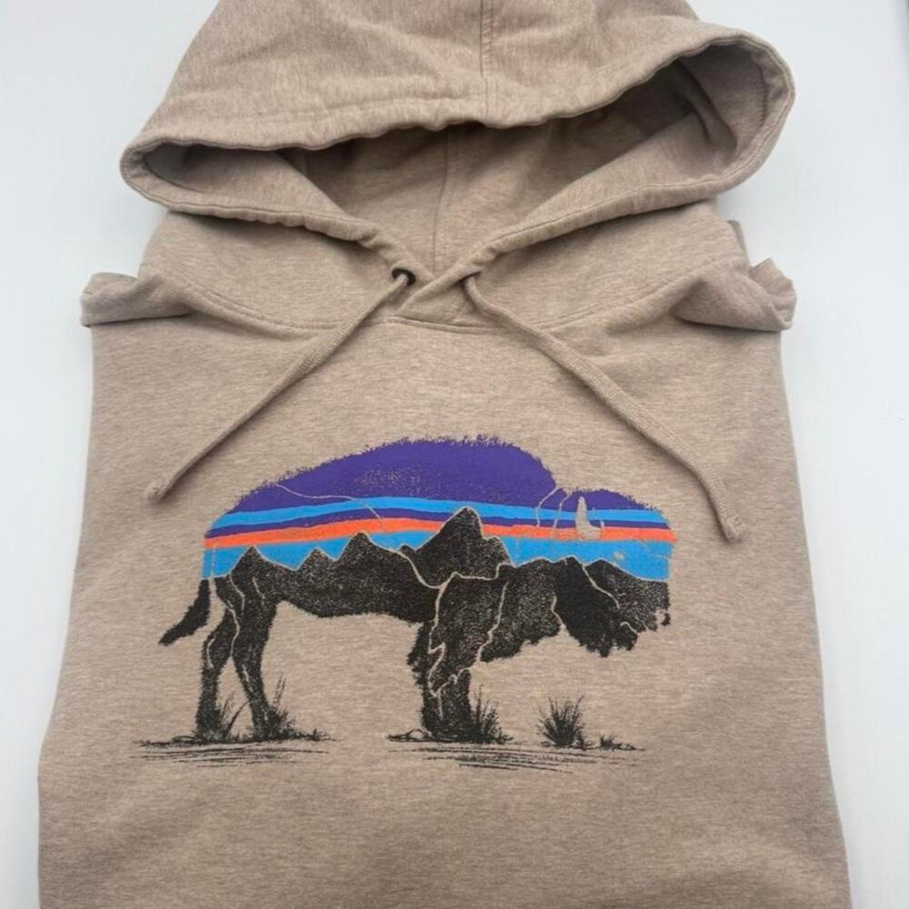 Patagonia Bison tan Hoodie mountain. Small spots (pictured)  Size Large